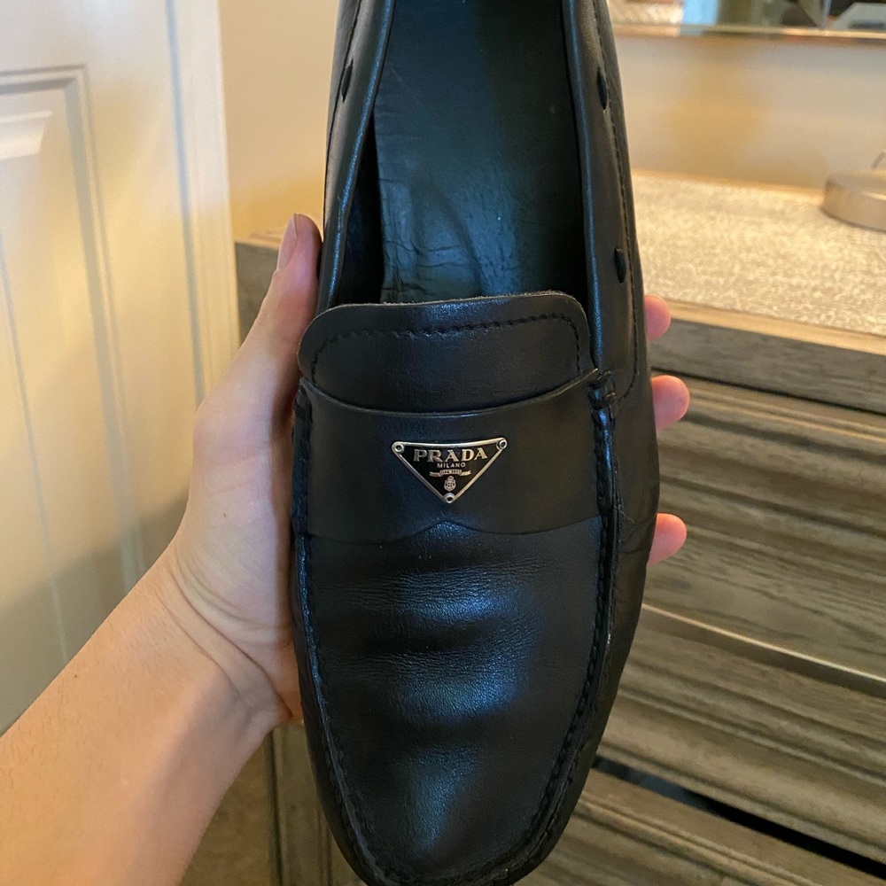 Black Prada slip on drivers. With Prada logo